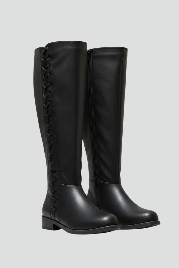 Black knee-high boots with lace-up design on a light gray background