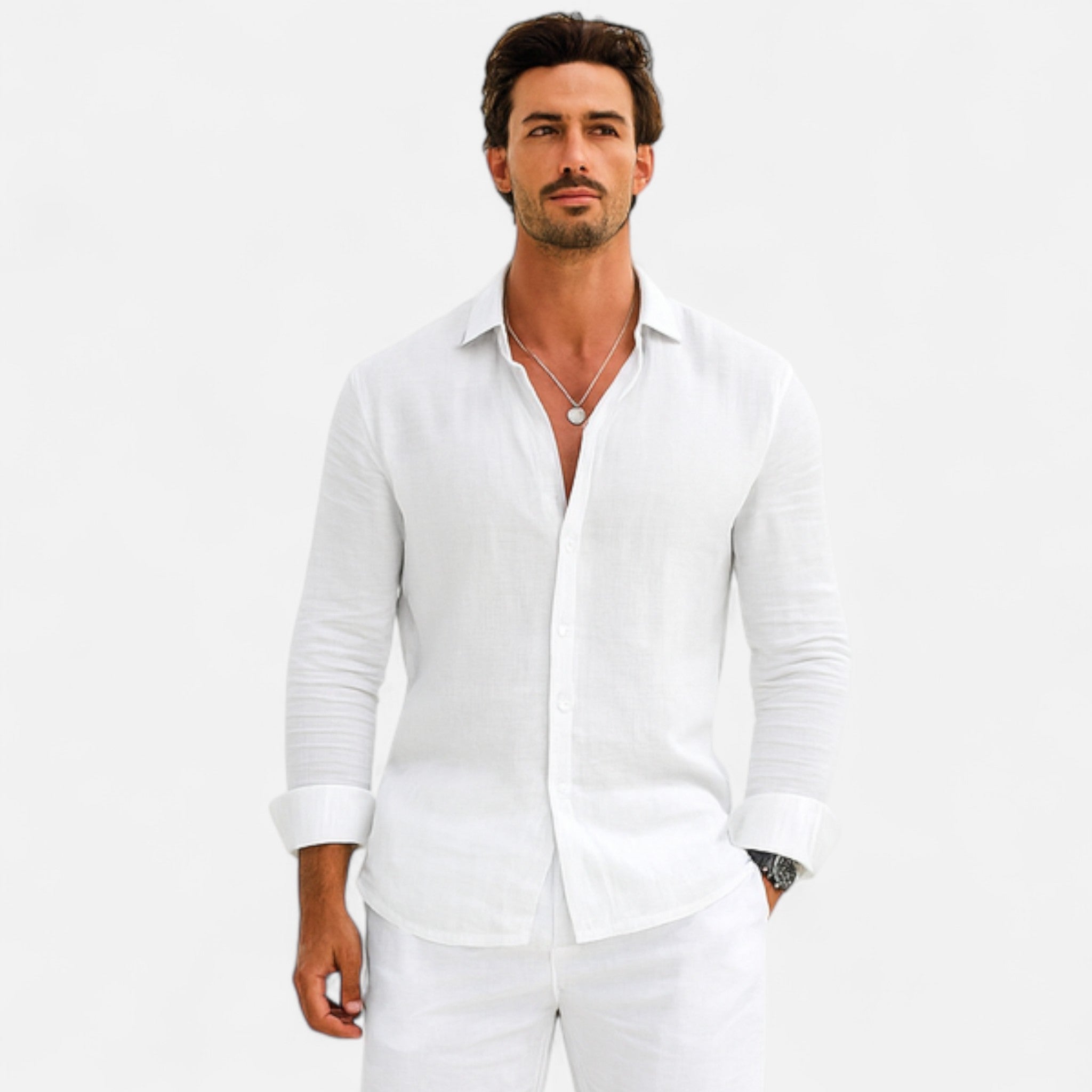 Man wearing a white shirt and pants on a white background