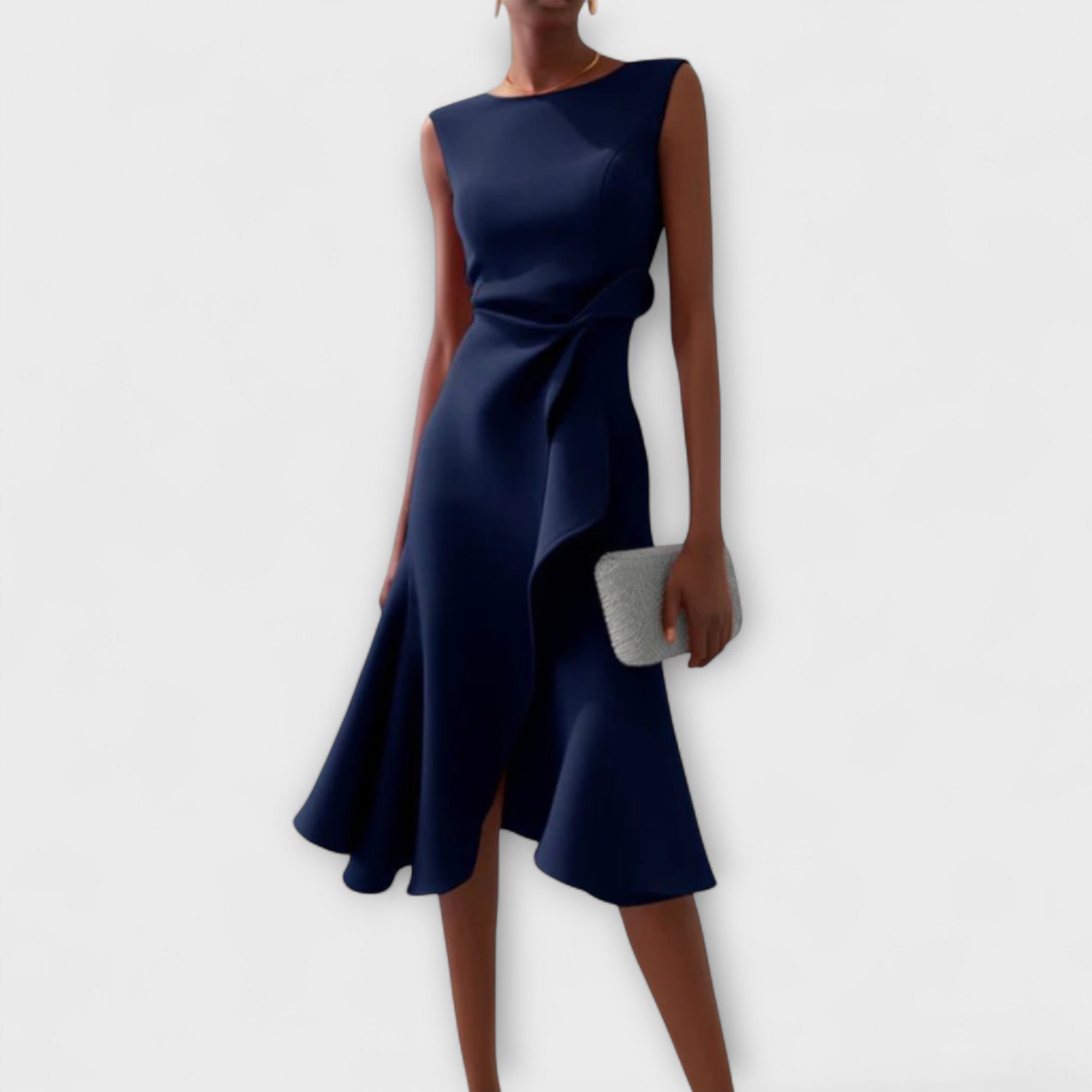Navy blue dress worn by a model on a white background
