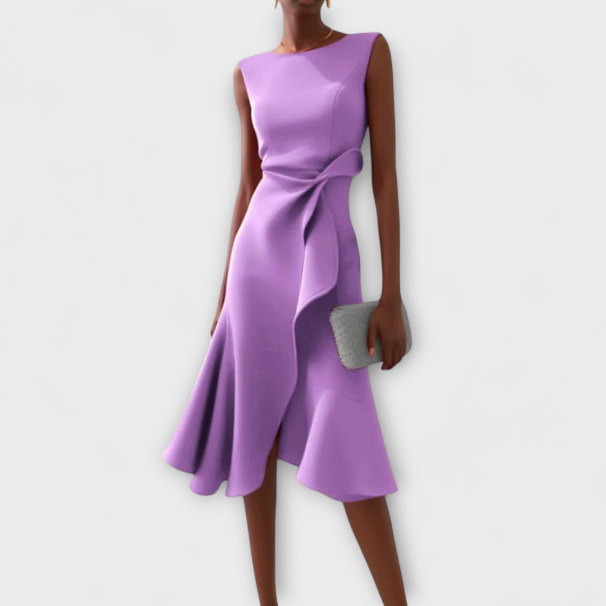 Purple dress with a bow detail on a white background