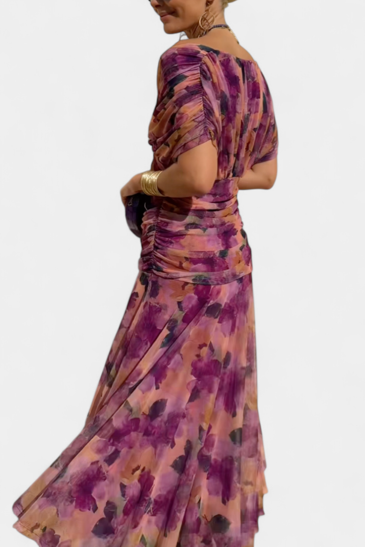 Woman wearing a floral dress with a white background
