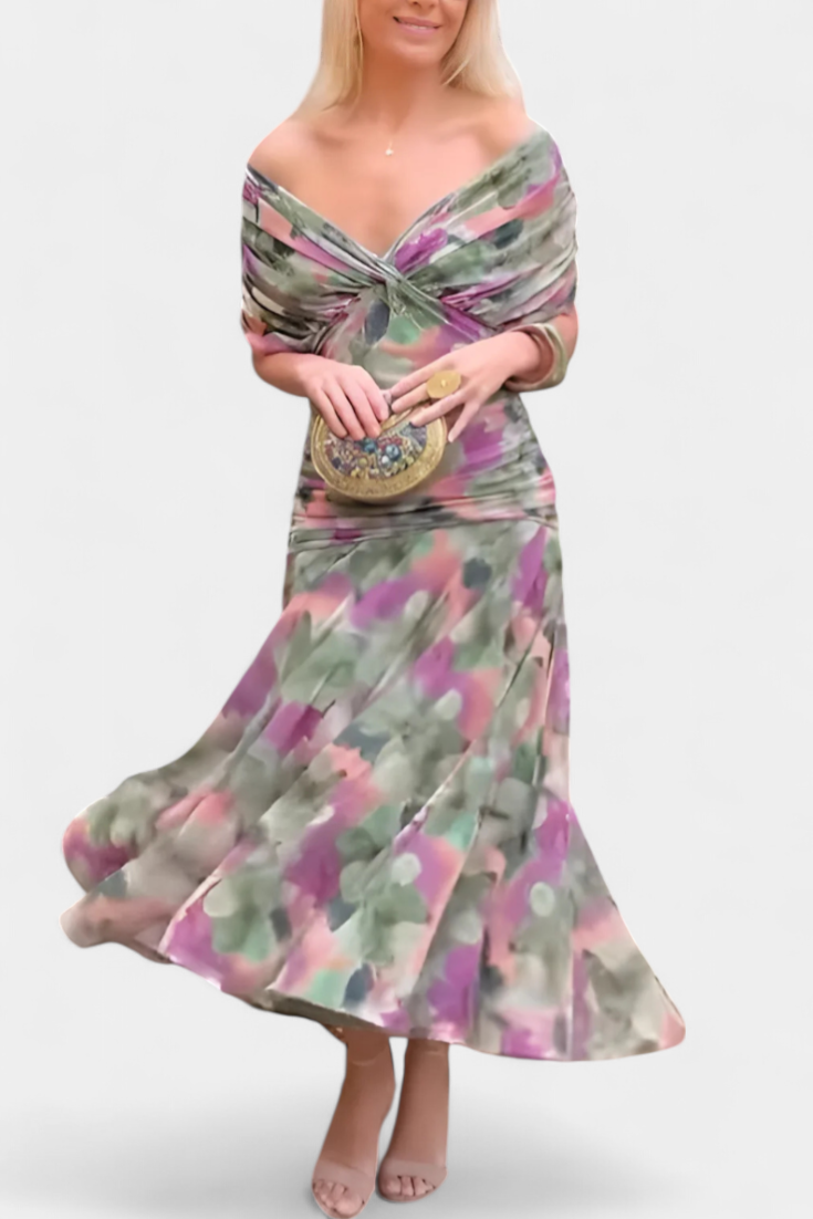 Woman wearing a colorful dress with a white background